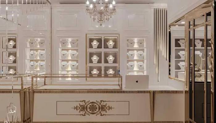 طراحی دکور طلافروشی با استیل طلایی